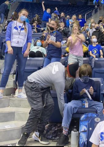 Students at a BYU Women's Basketball game 