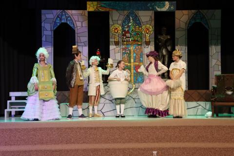 Mrs. Potts speaking to Chip as Madam Bouche, Cogsworth, Lumiere, and Babette