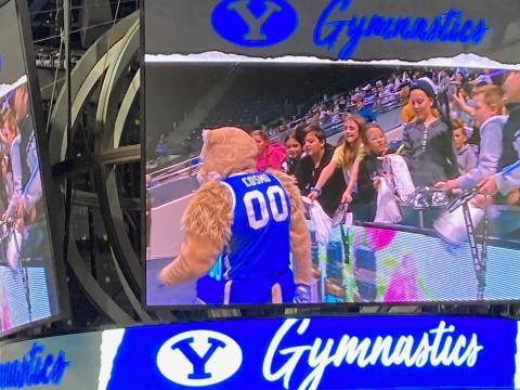 Students caught on the Jumbo Tron monitor with Cosmo