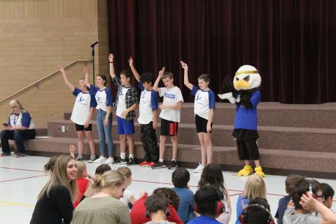 Student Council, and ACE the Eagle, leading the School Song