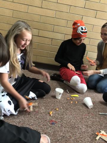 Students playing Halloween games