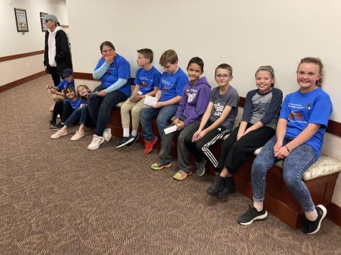 Student Council students waiting to present at board meeting