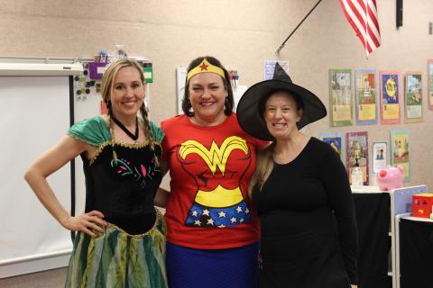 Pre-school team dressed in various costumes Ana from Frozen, Wonder Woman and a witch