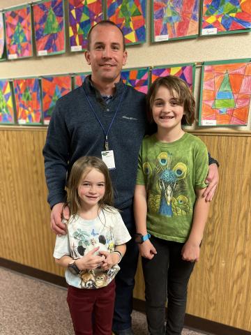 A Dad with his Daughters for the Watch DOGS Program