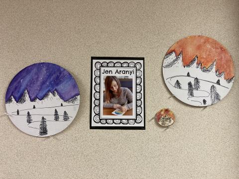    Jen Aranyi and two students interpretation of a mountain scene on disks