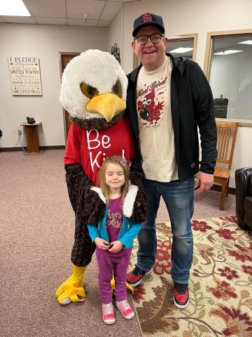A Dad, the Eagle Mascot and a daughter
