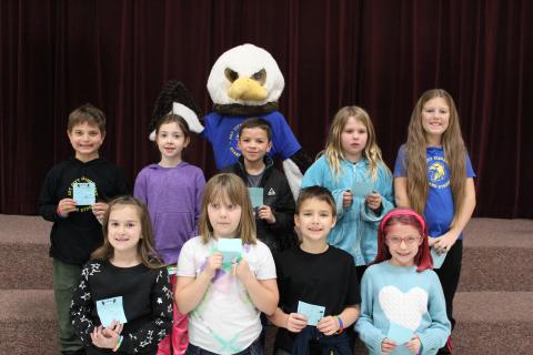 Eagle Mascot and Nine students recognized as peer nominated Stand Strong Students