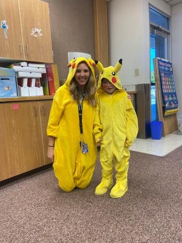 Student and teacher dressed as Pikachu