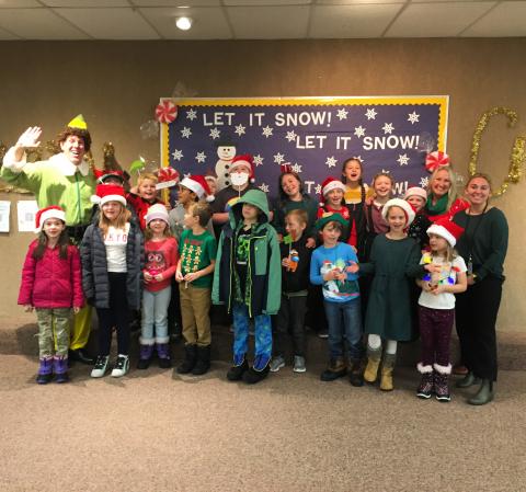 Mrs. Roundy's Third grade class with Buddy the Elf