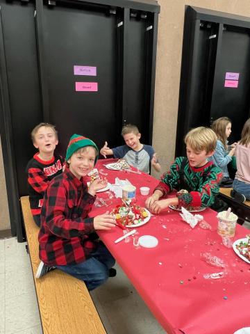 Students decoration their Gingerbread creations. 
