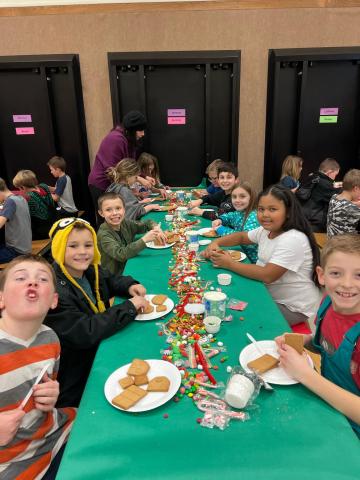 Students decoration their Gingerbread creations. 