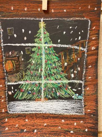 Student artwork of a Christmas tree through a cabin window