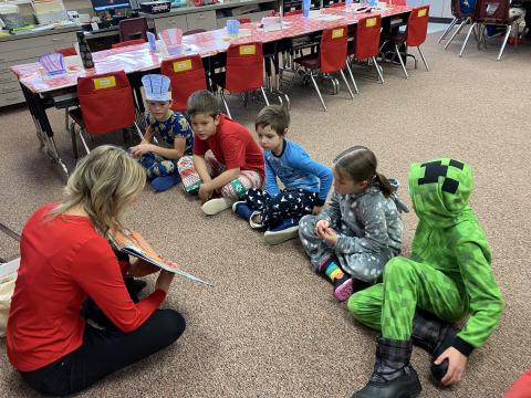 Students listening to a story. 
