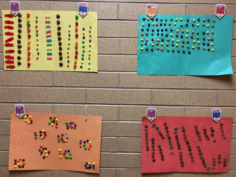 Bulletin Board Posters of 100 items:  10 rows of various candies, skittles, 10, 10s made with M&Ms and 10 rows of pennies