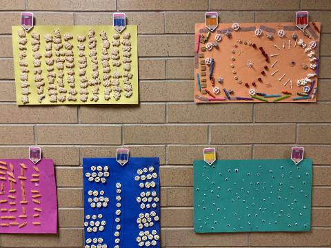 Bulletin Board Posters of 100 items:  animal crackers, various items including q-tips, candies, birthday candles, etc; Noodles, Cereal and google eyes.