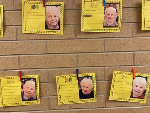Bulletin Board:  Kindergarten students morphed into 100 year old selves