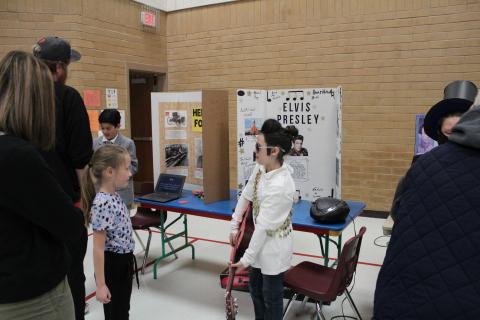 Students Dressed as characters in History; Elvis Presley, Abraham Lincoln, and Henry Ford