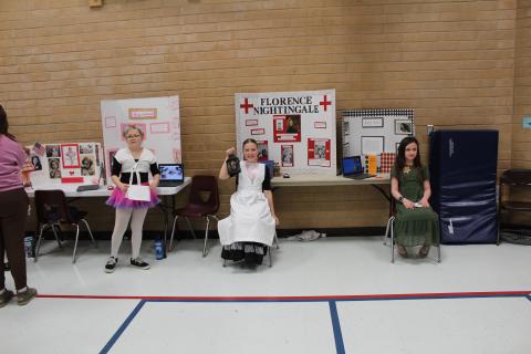 Students Dressed as characters in History Mitsy Copeland, Florence Nightingale, and Ann Frank