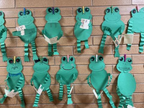 Bulletin board: ten frogs reading their favorite book