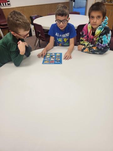 students playing bingo as they learned about the habitats 