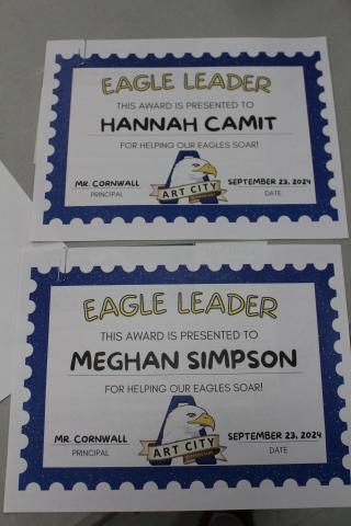 Certificates for Hannah Camit and Meghan Simpson