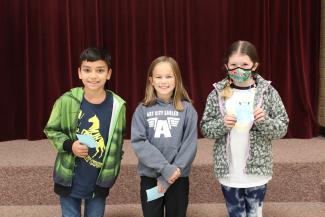 Three students that were recognized by their peers for standing strong