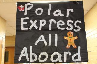 Polar Express All Aboard poster welcoming students to the North Pole