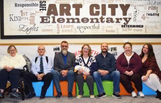 The Douglas family and others at Art City Elementary School