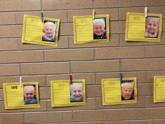 Bulletin Board:  Kindergarten students morphed into 100 year old selves