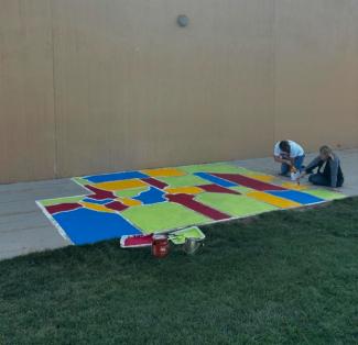 United Ways Volunteers refurbishing the Utah map.